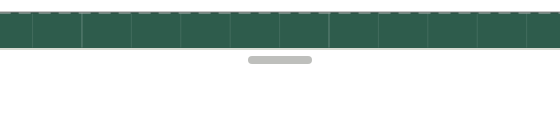 The grip, a short grey bar on the edge between the green board and the log